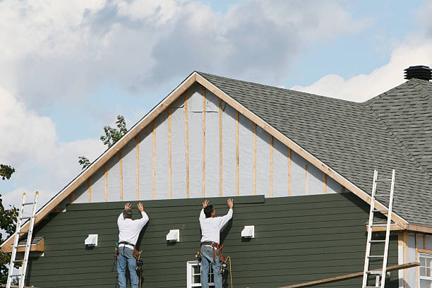 Professional Siding Installation technician working in Williamsburg, PA